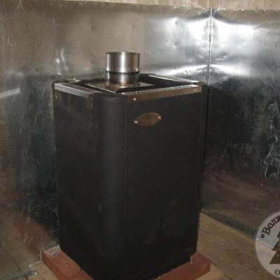 Печь в каркасно-щитовой бане с теплоизоляцией